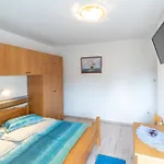 Apartments And Rooms By The Sea Palit, Rab - 5010